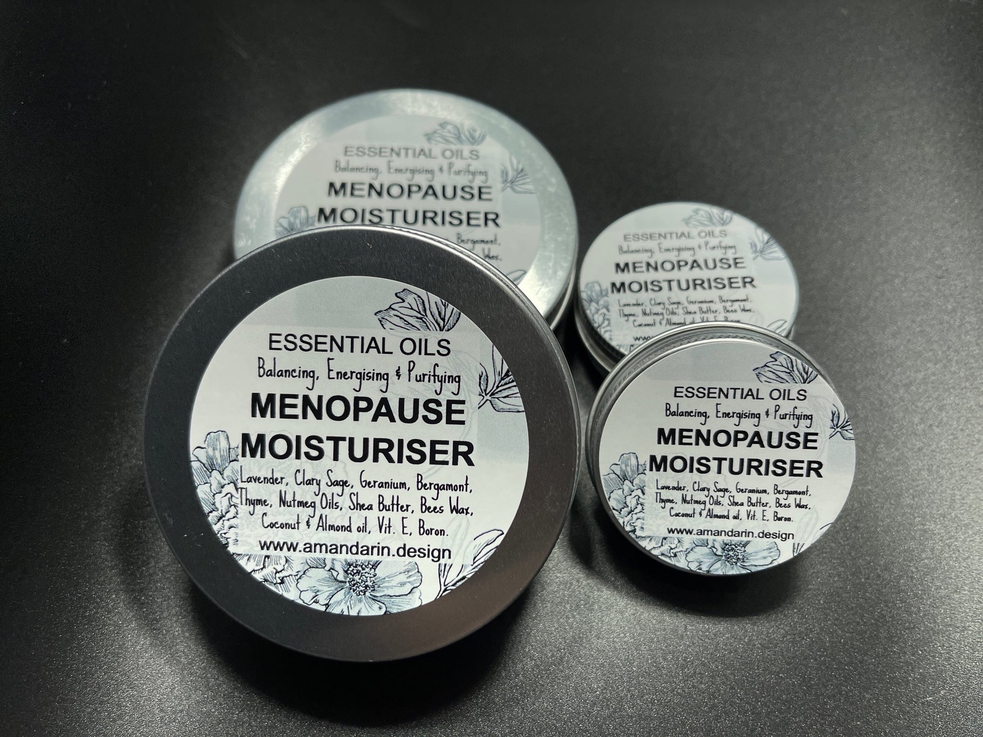 MenoMode menopause essential oil moisturizer tins with essential oils for balancing energizing and purifying skin