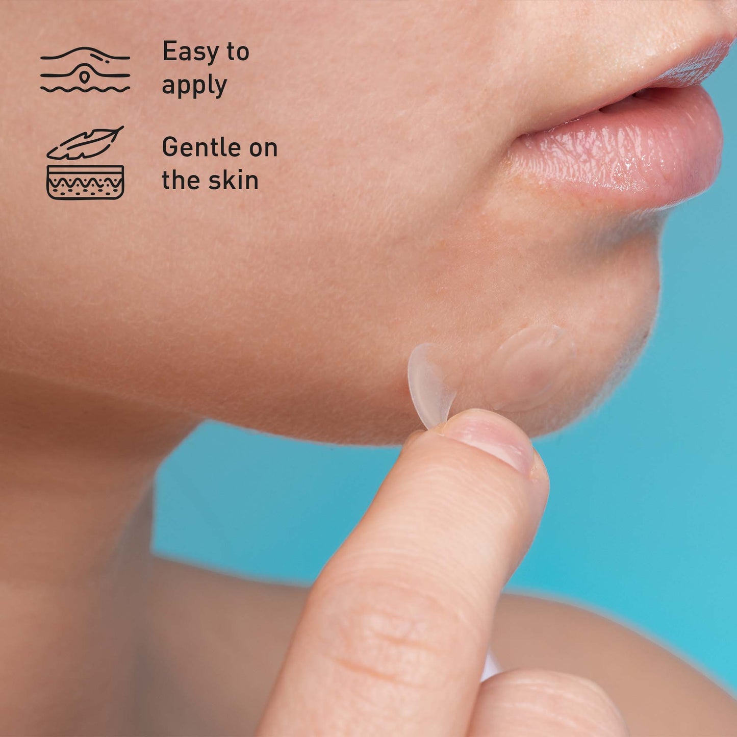 Close-up of person applying best pimple patch for menopause on chin showing easy to apply and gentle on skin features
