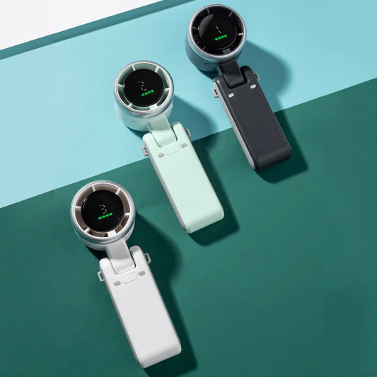 MenoMode compact fan for hot flashes in white, mint green, and black with digital display and foldable design