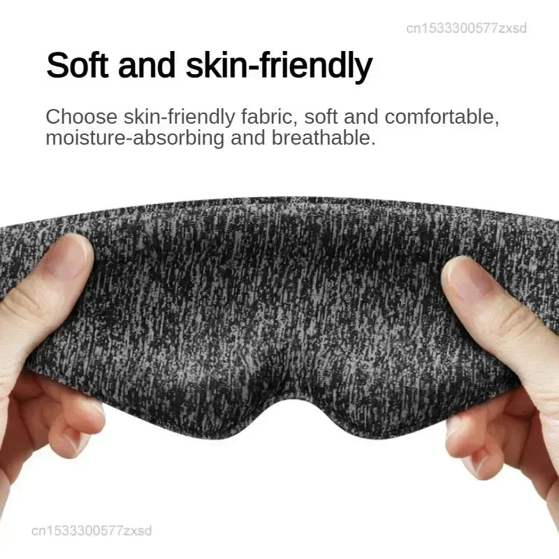 MenoMode comfort sleep mask for women in black soft skin-friendly fabric held by hands