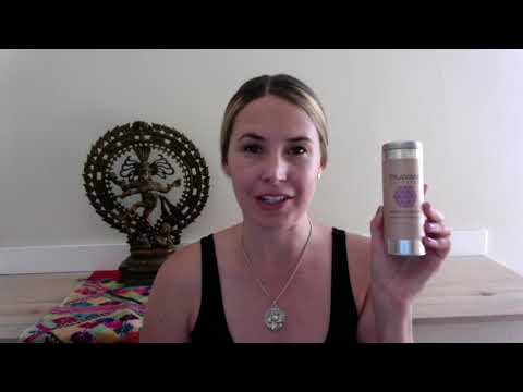 Woman holding DC-PAAVANI Ayurveda ayurvedic tea for hormonal balance in a natural home setting