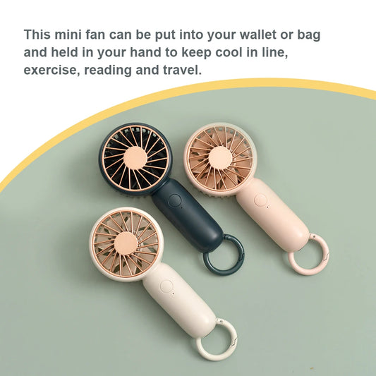 MenoMode rechargeable mini handheld fan available in black, beige, and white colors with ring handle