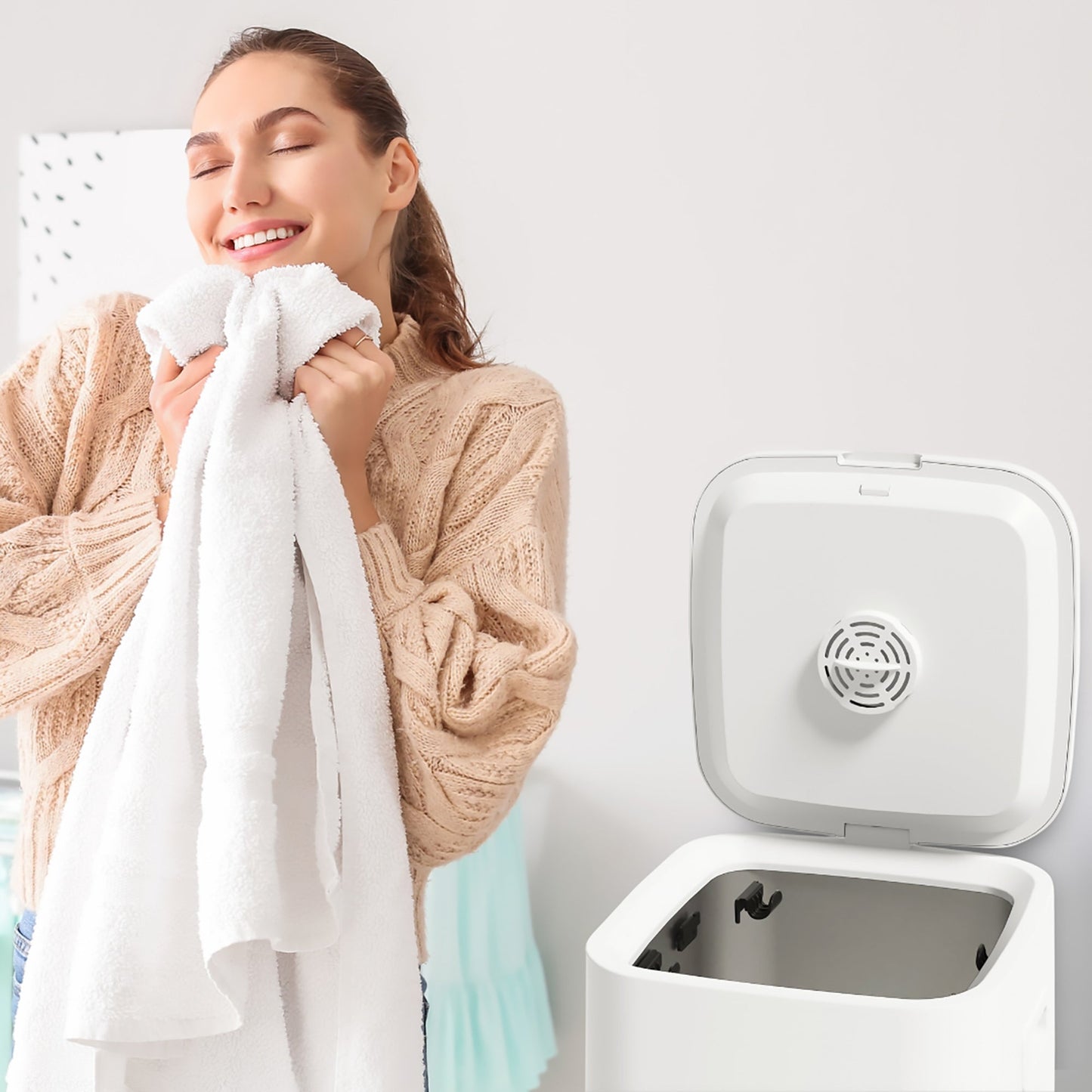 Woman enjoying soft towel warmed by DC-PURSONIC towel warmer for menopause comfort in a bright room